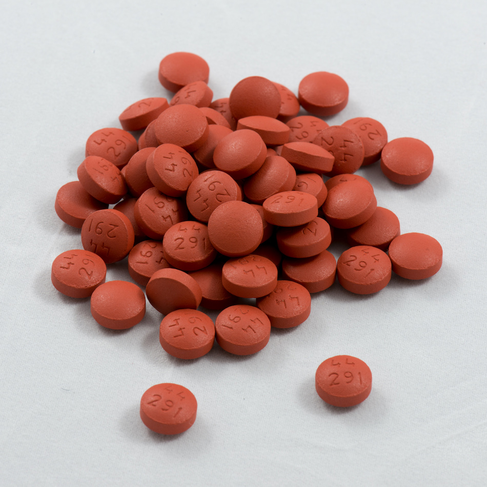 Pile of Ibuprofen tablets