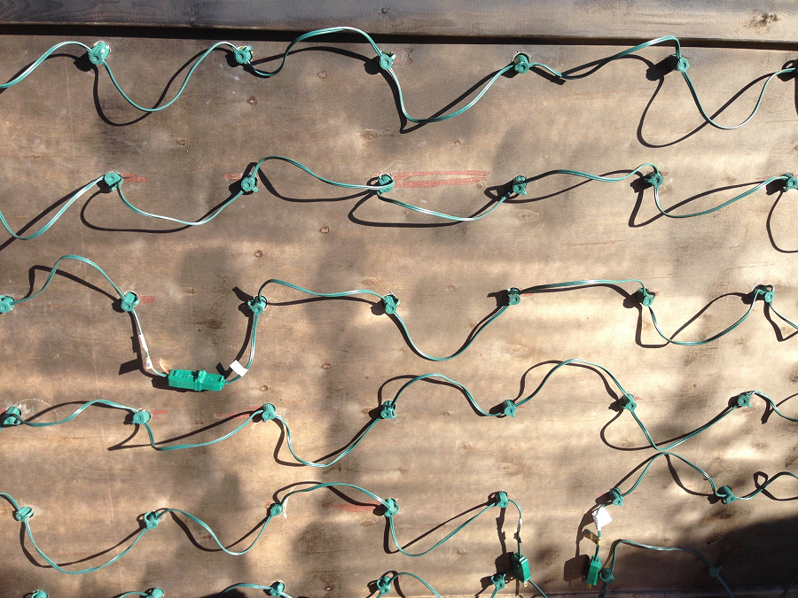 rusty-bedspring-marquee-lights-wires-in-back.png