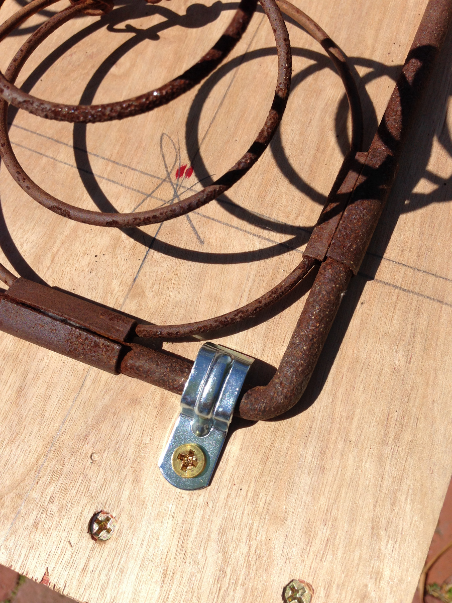 rusty-bedsprings-drill-hole-marks.png