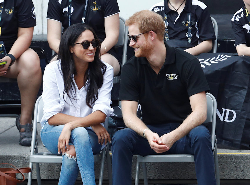 Britain's Prince Harry arrives with girlfriend actress Markle at the wheelchair tennis event during the Invictus Games in Toronto