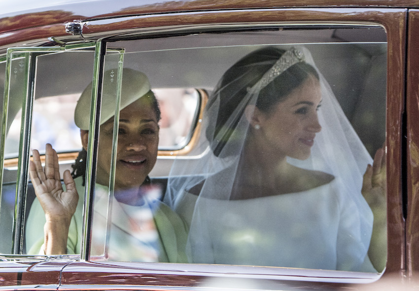 Meghan Markle and her mother Doria Ragland head towards Windsor castle.