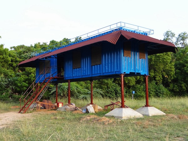 tiny-shipping-container-home-on-stilts.jpg