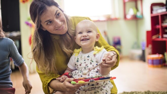 She love music so much. Baby in music school.