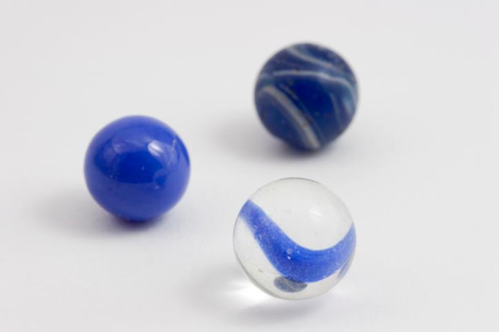 Three blue marbles.