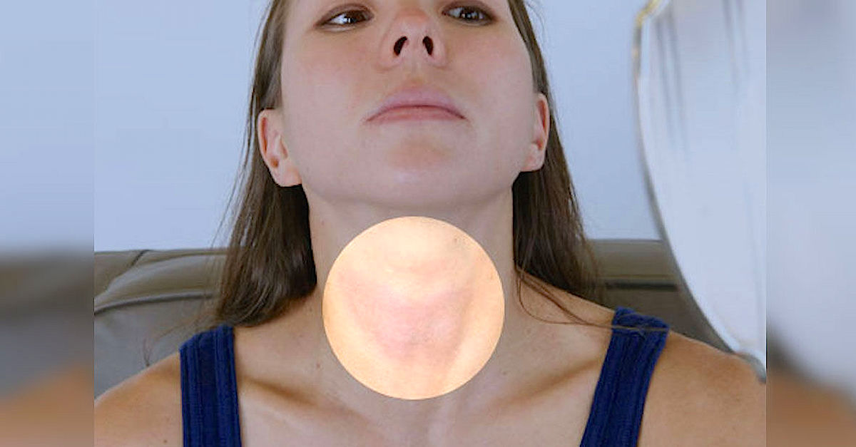 webmd_rf_photo_of_woman_checking_thyroid copy