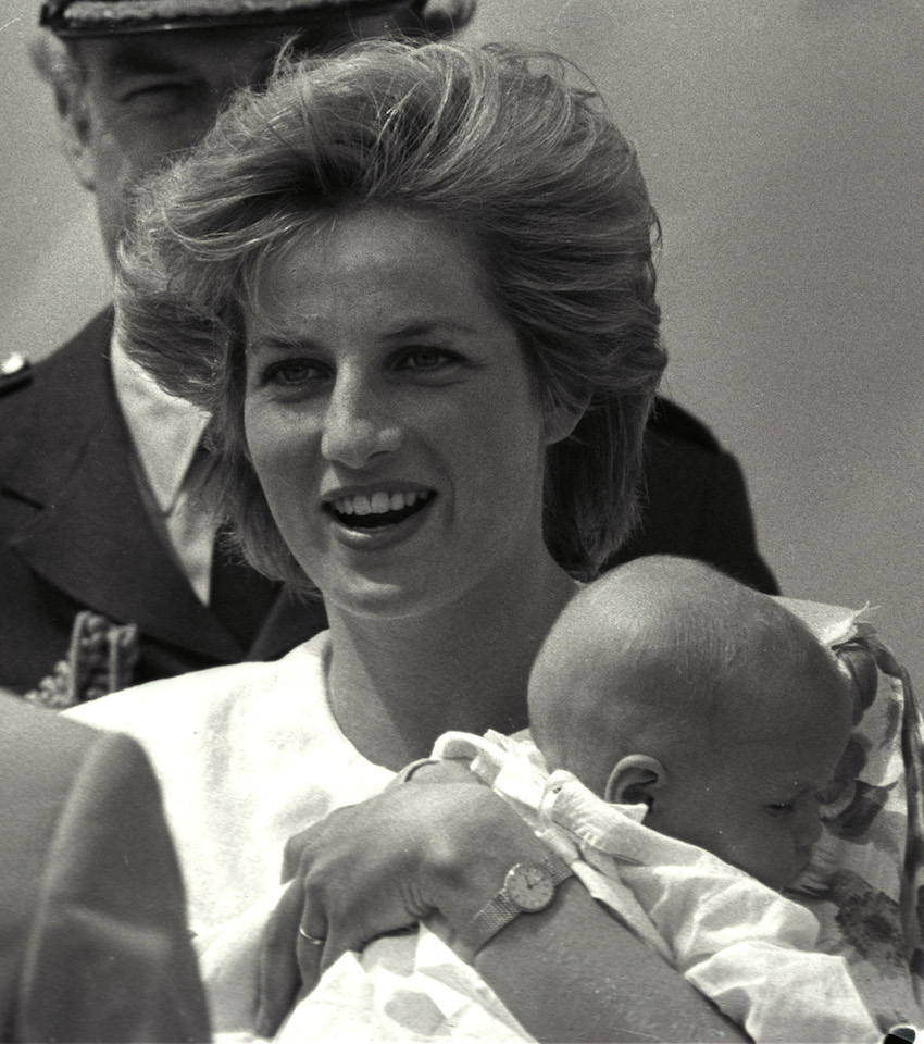 PRINCESS DIANA HOLDS HER GOD DAUGHTER MARY DAUGHTER OF MARQUIS OF DUORO.