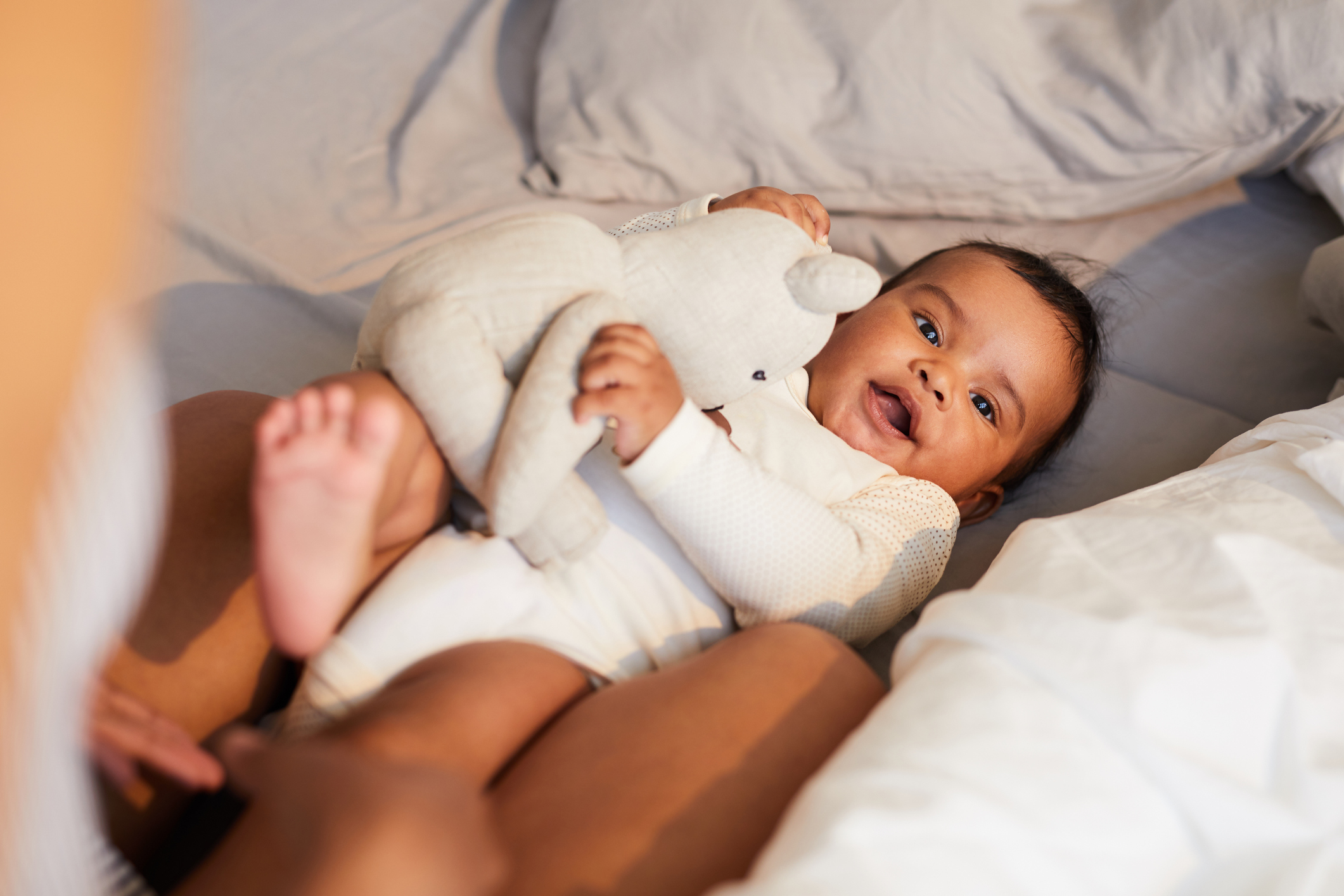 African baby boy with toy