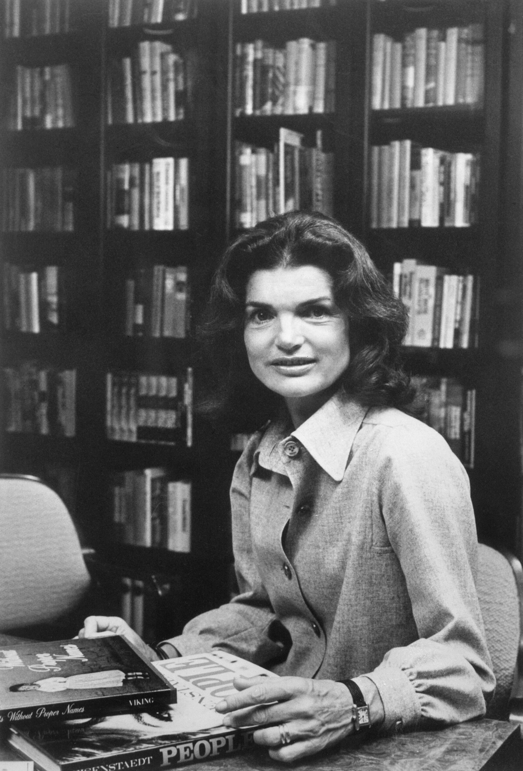 Jacqueline Kennedy Onassis Sitting at Desk With Books