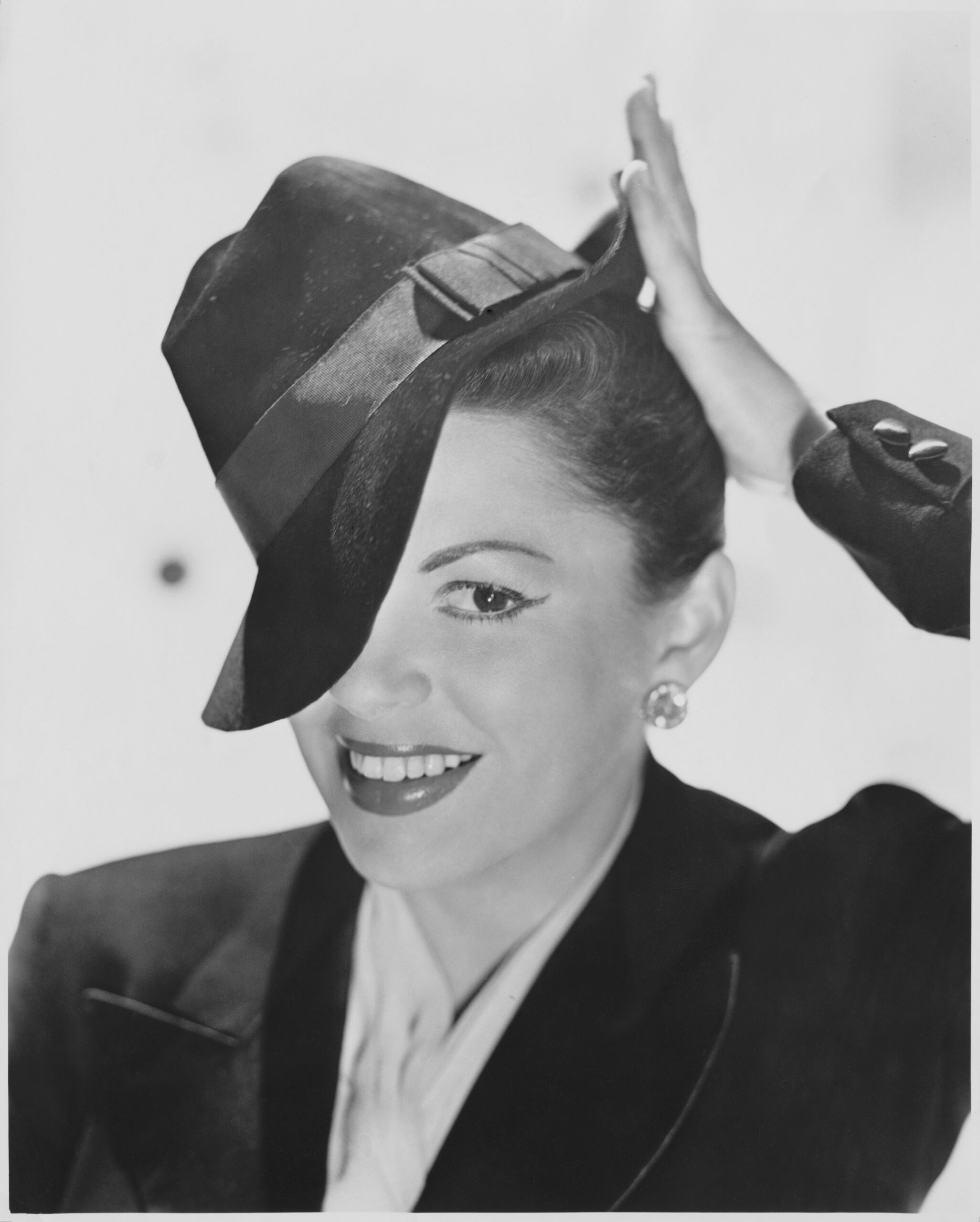 Actress Judy Garland Tipping Fedora