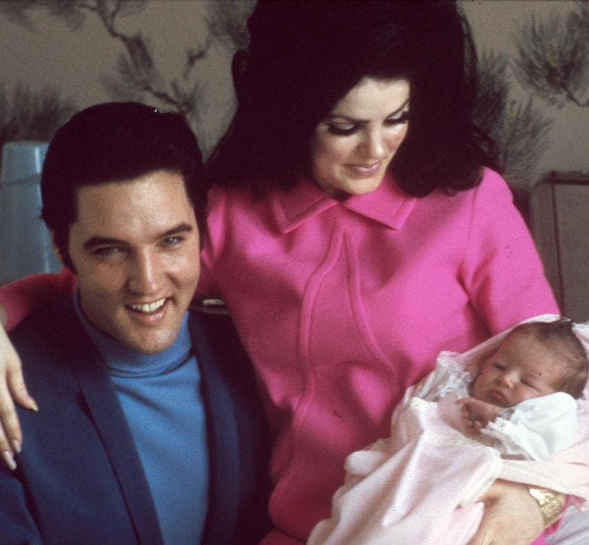 Elvis Presley and Priscilla with baby Lisa Marie