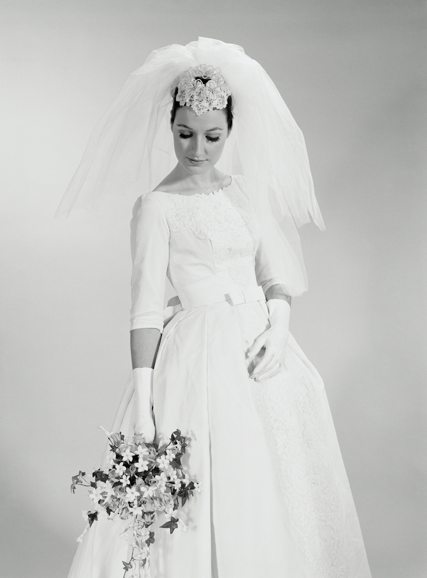 Bride holding bouquet.