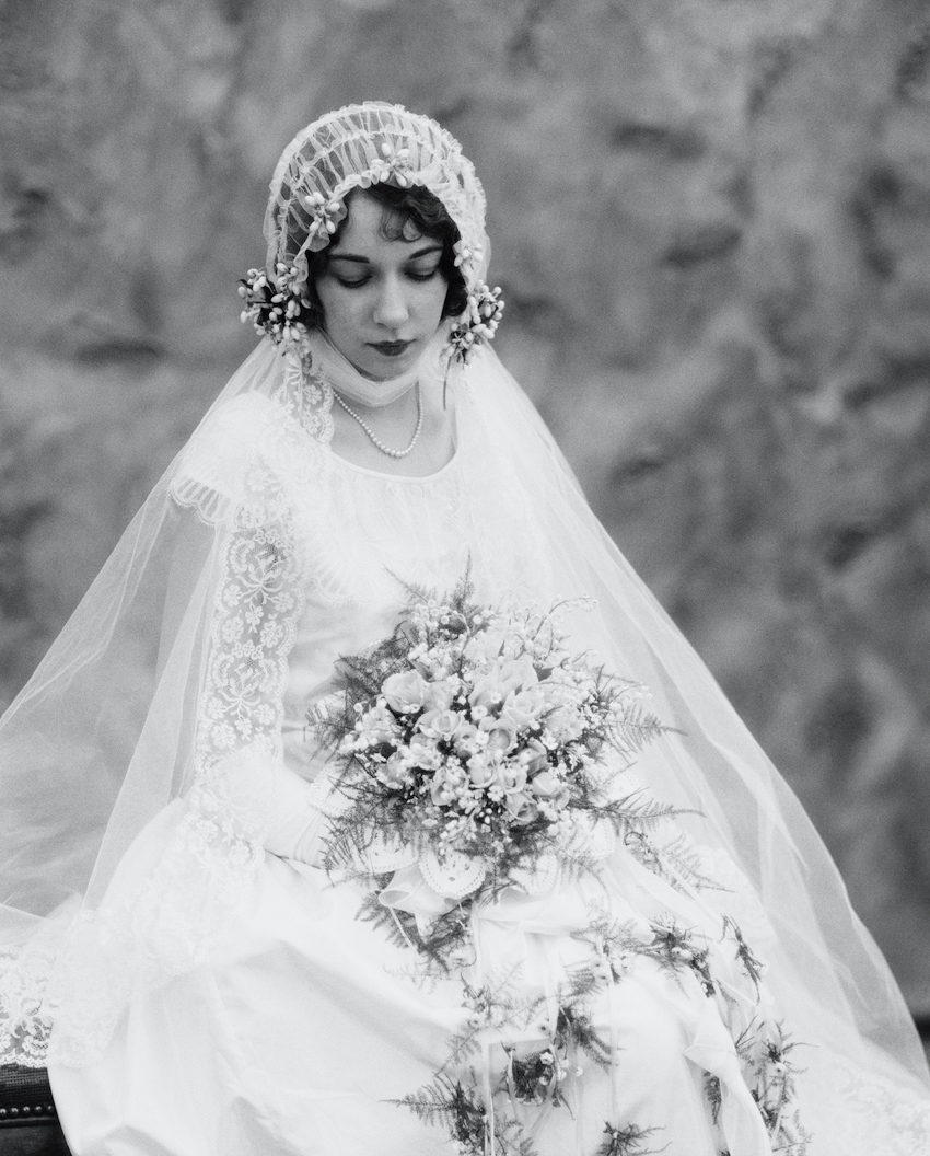 Bride holding bouquet.