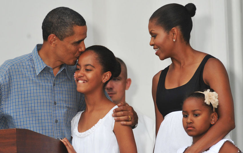 US President Barack Obama kisses his dau