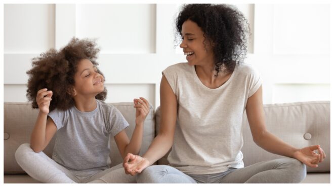 mom and daughter listening to music