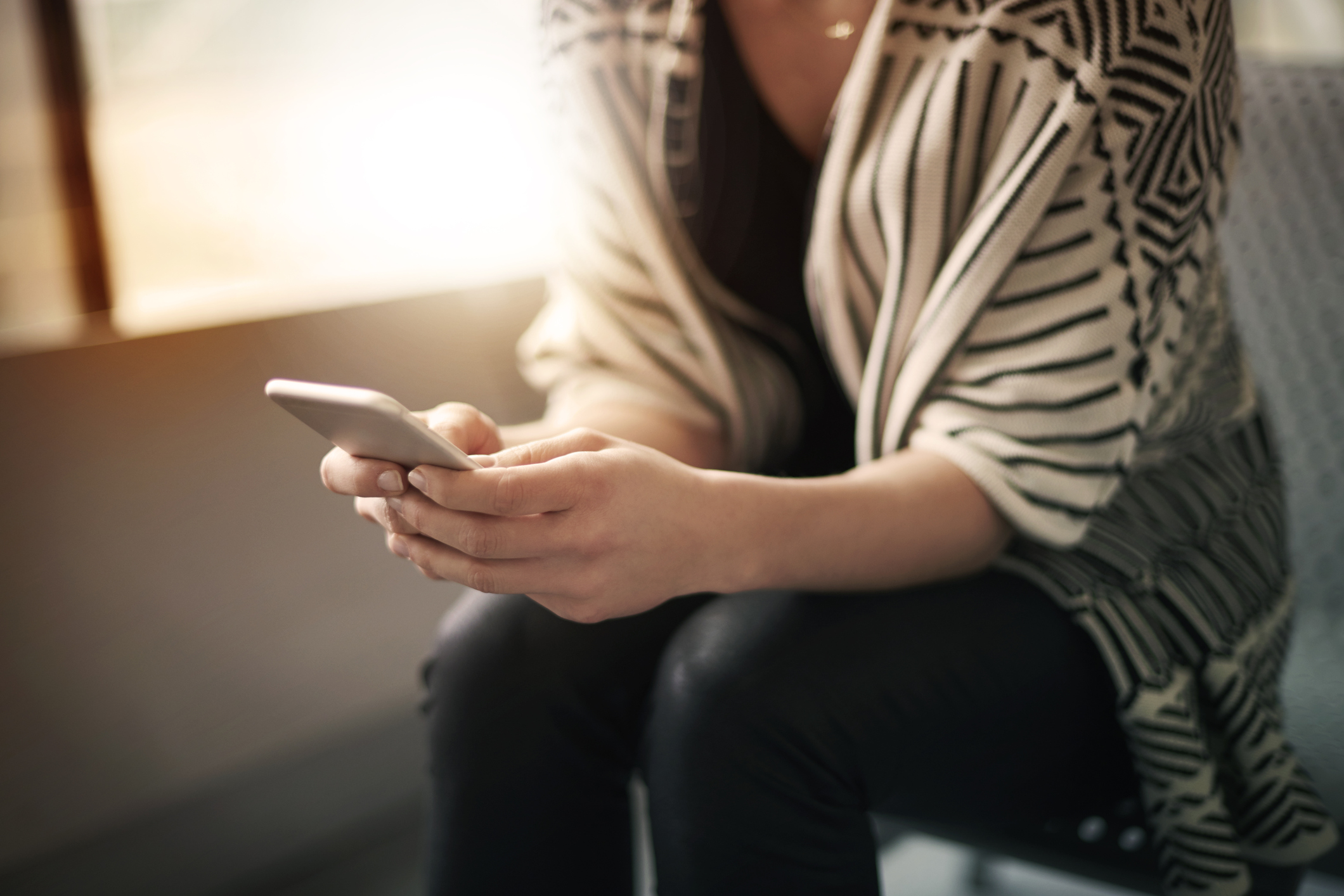 Close up of woman with smartphone