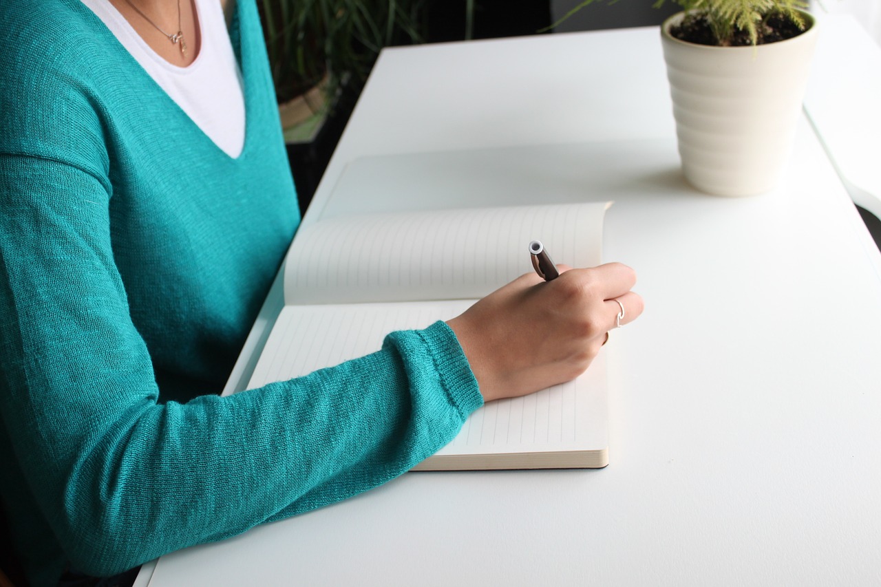 White Woman Blue Desk Write Hand Female Writing