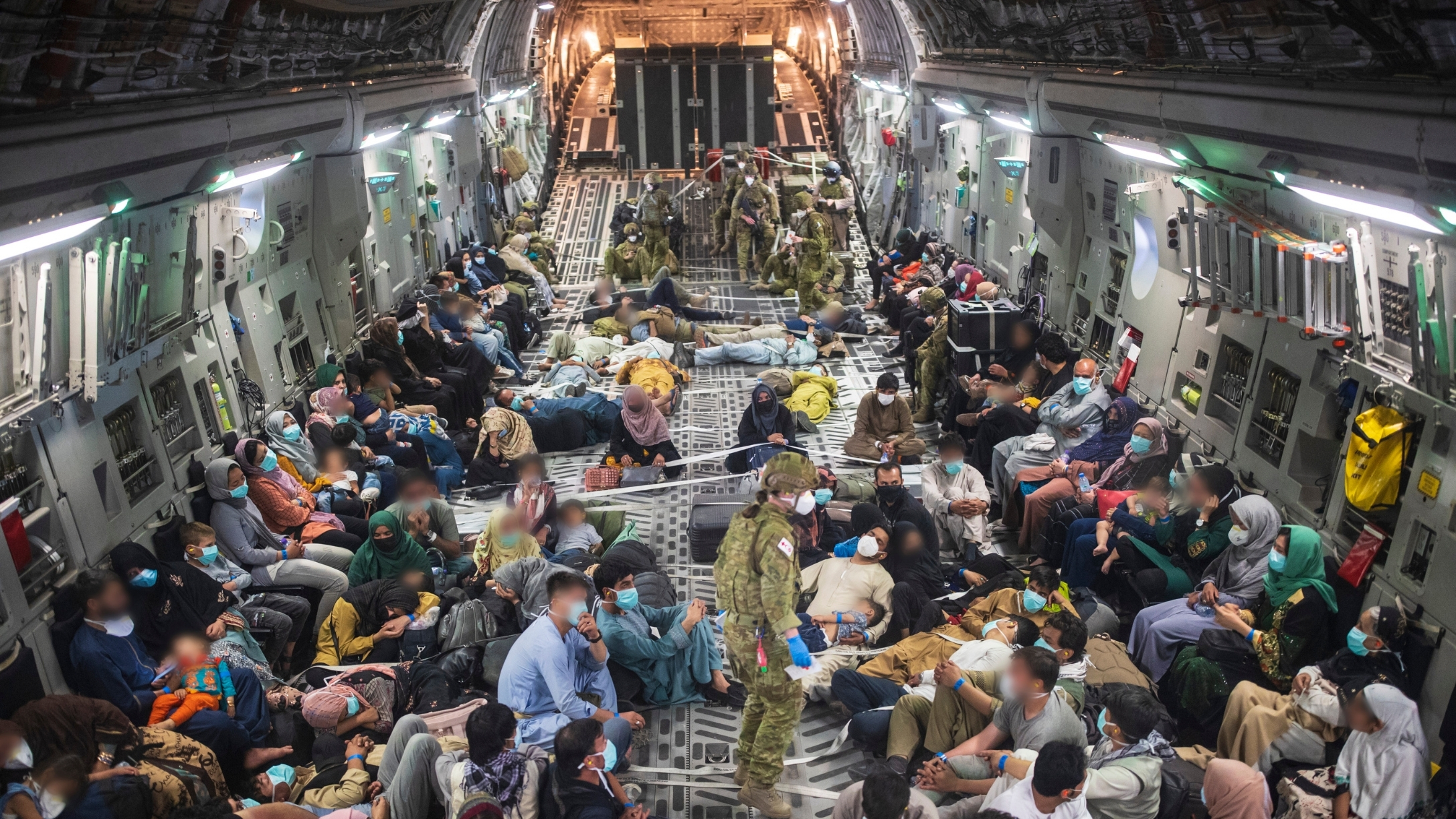 afghan-woman-evacuation-labor