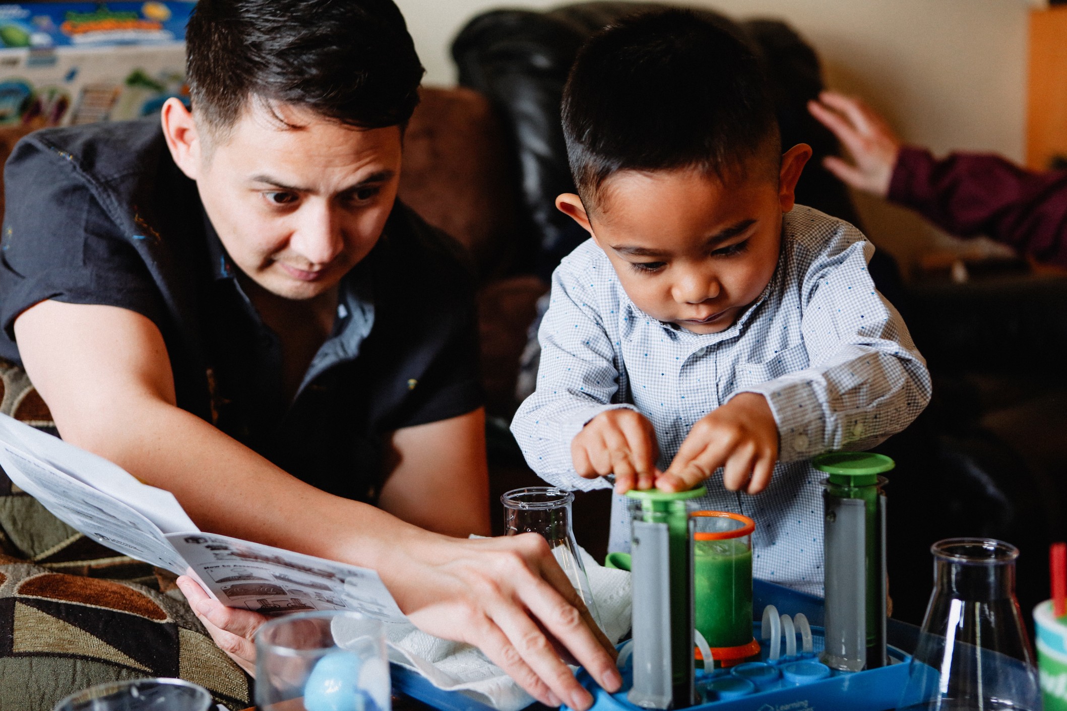 brothers-father-son-spending-family-quality-time-together-doing-science-experiment-homework-at-home_t20_Lzm1YY.jpg