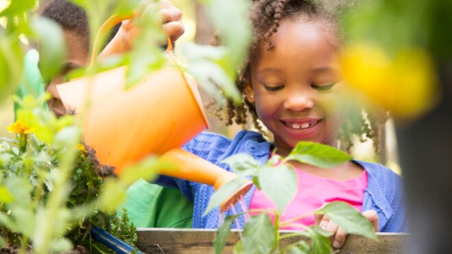 girl-gardening-vegetables