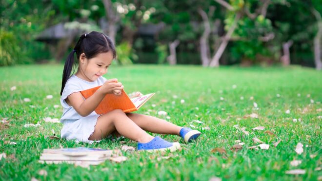 girl-reading-field