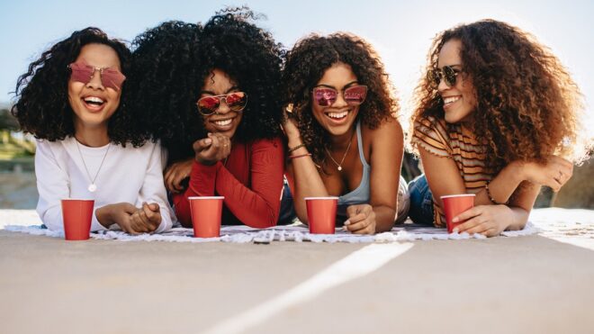 Girls enjoying weekend on beach