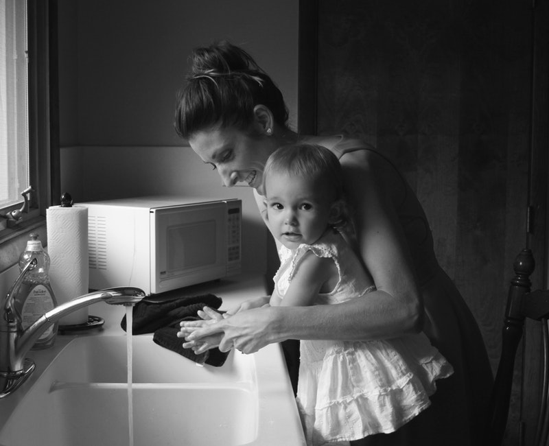 grayscale-photography-of-mother-and-child-1089077.jpg