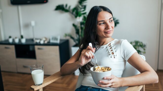 Enjoying healthy breakfast at home.