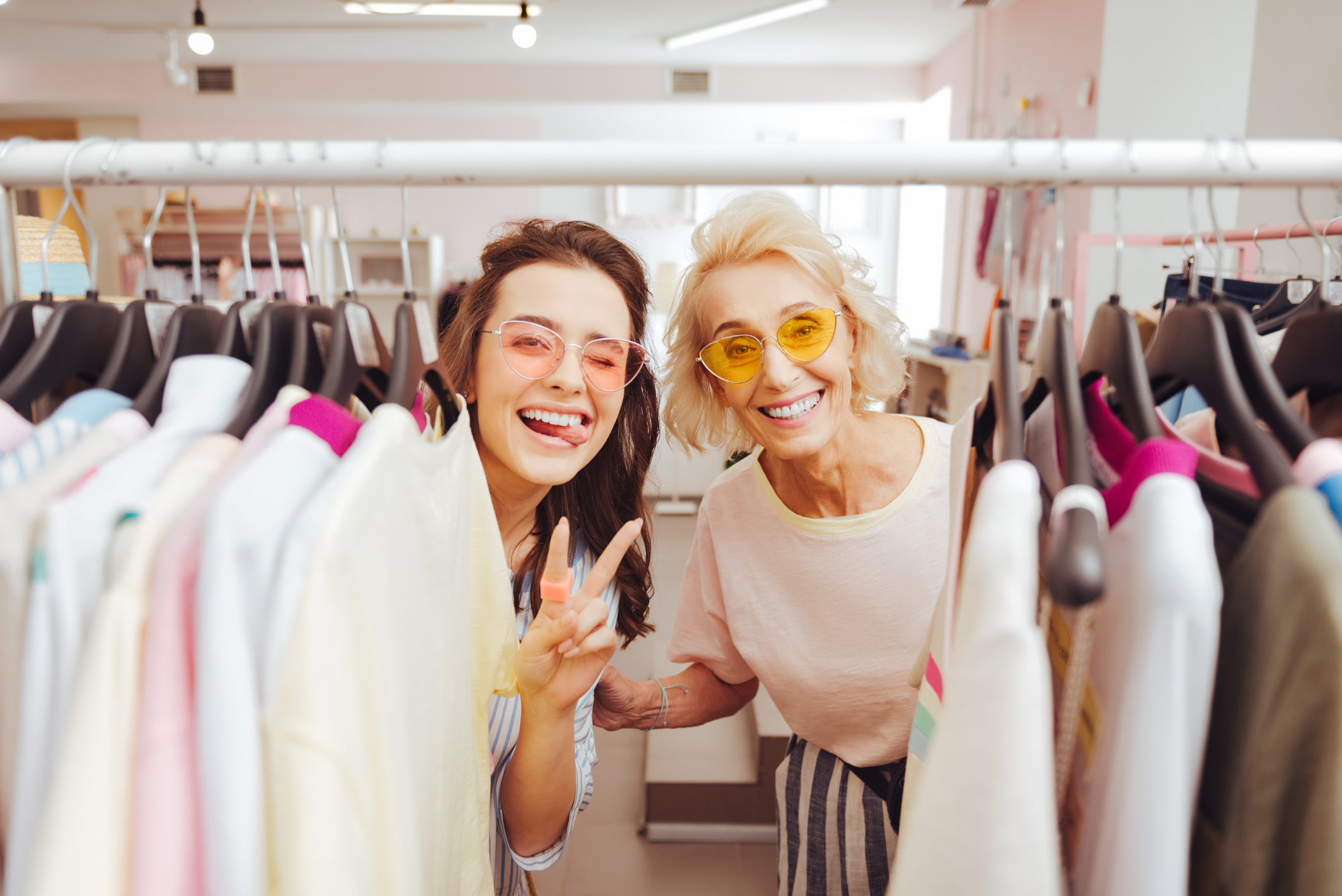 Two beautiful women having fun while shopping together