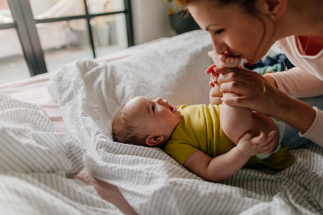 Smiling baby and his mom