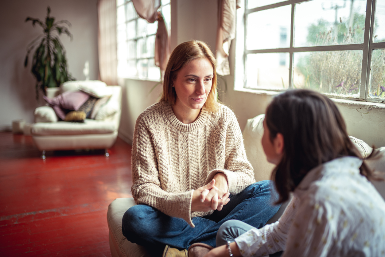 Mother and daughter having a talk.