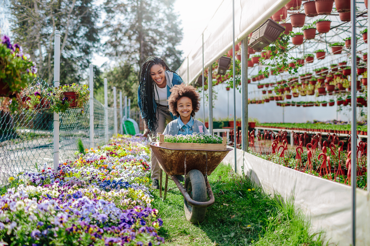 Mother And Daughter Gardening