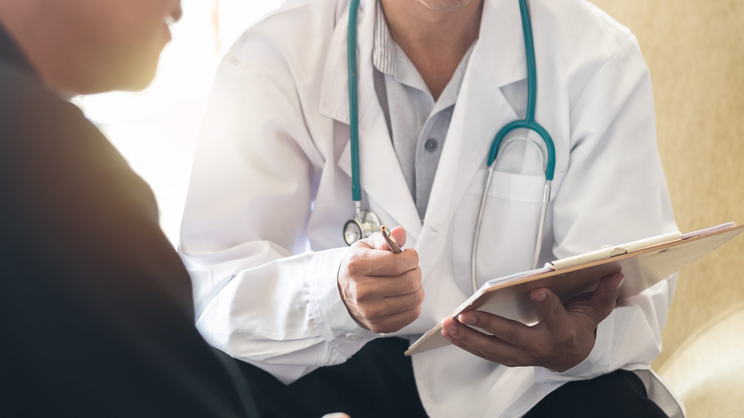 Patient talking to doctor