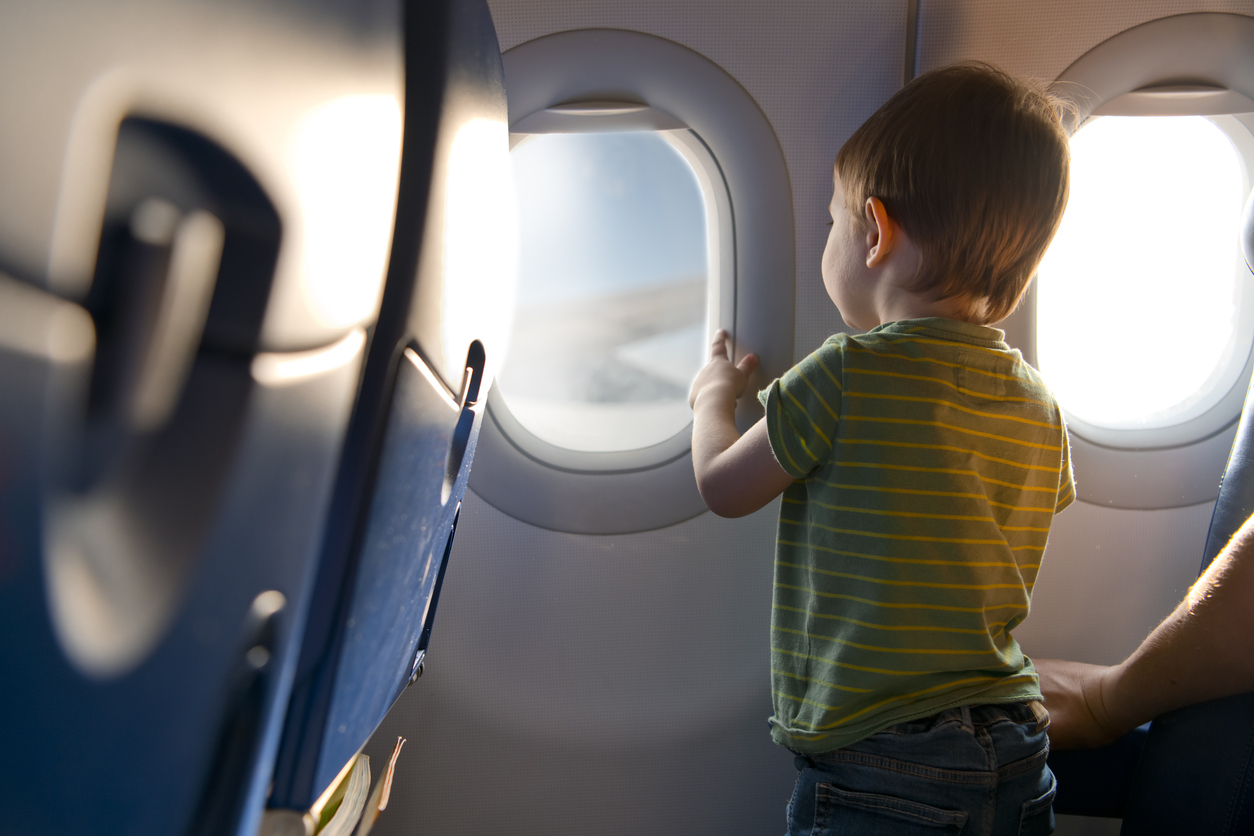 Child travelling by plane