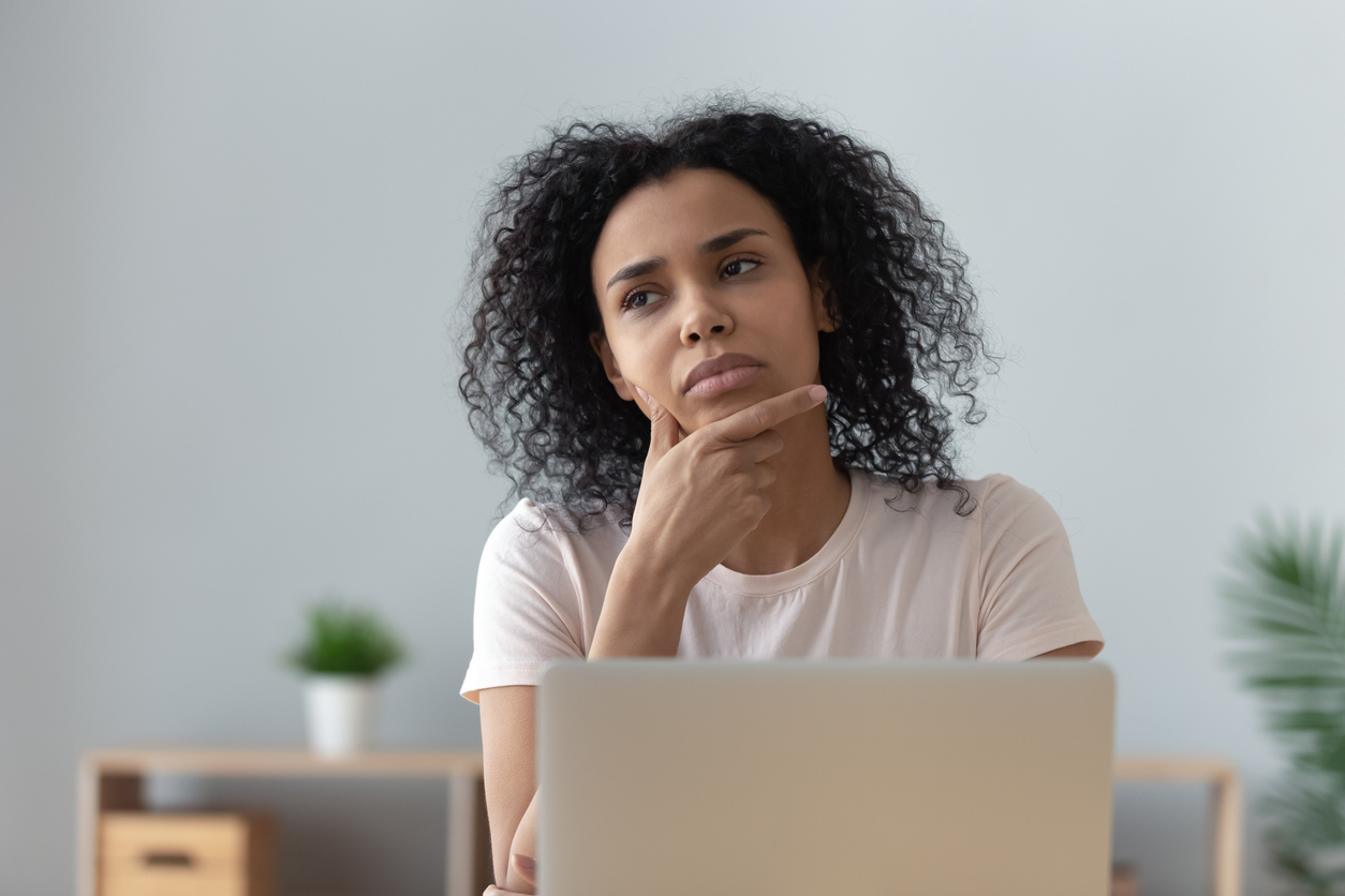 Thoughtful doubtful african student thinking feel lack of creative ideas