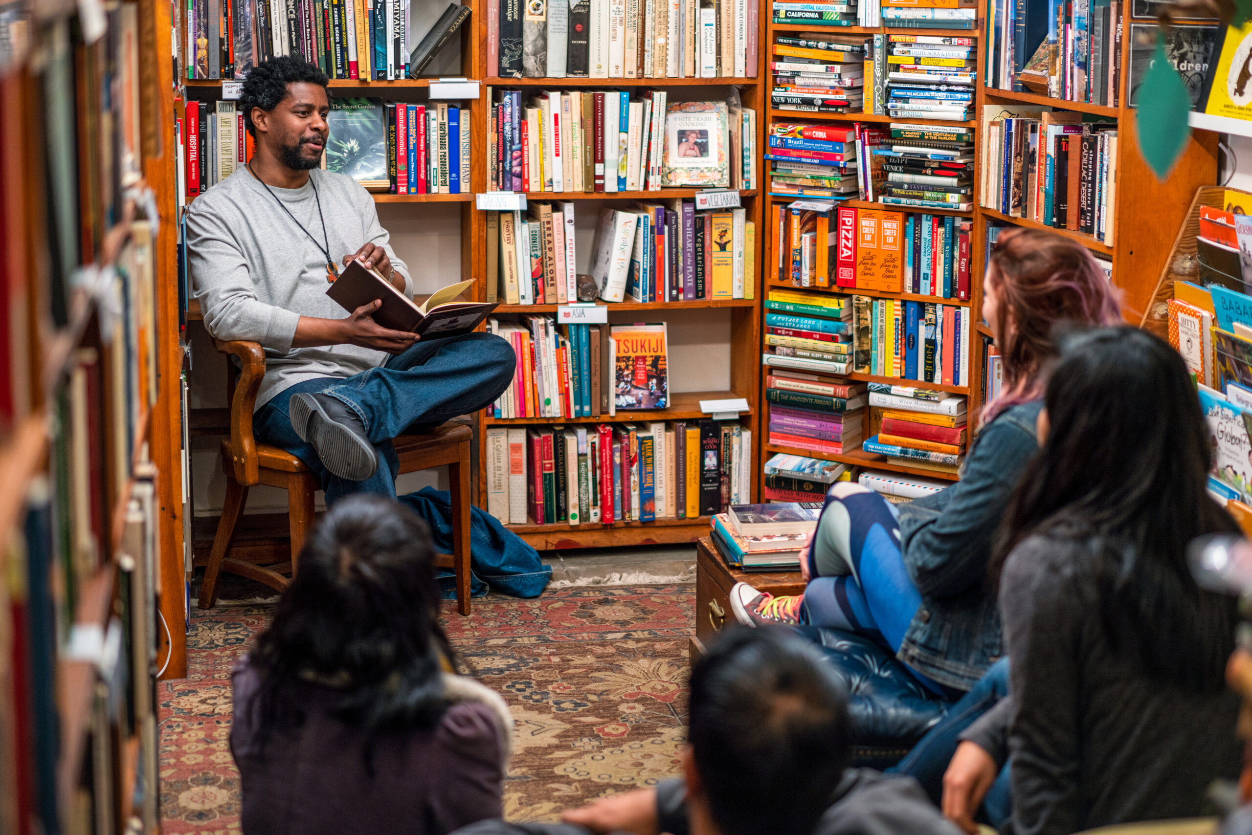 Reading at a book group meeting