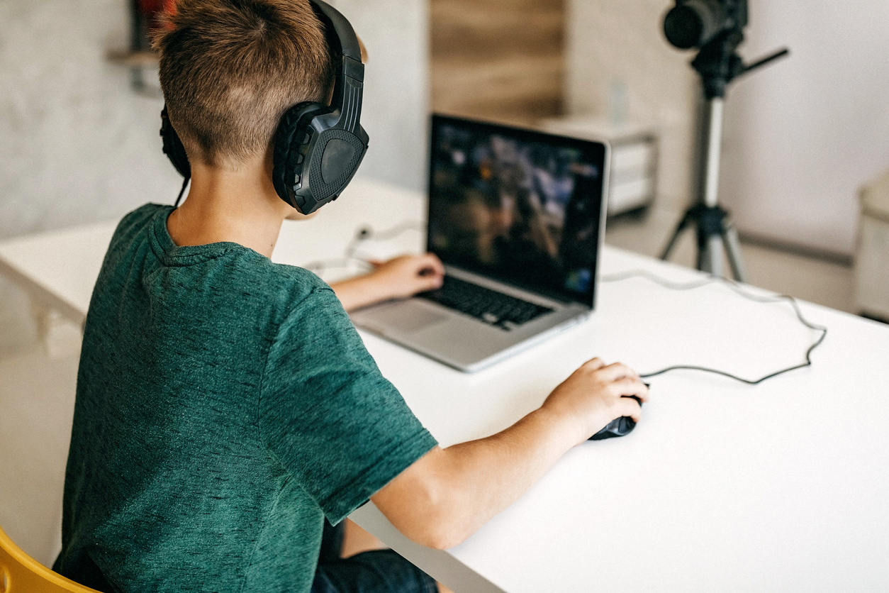 Kid recording his gameplay for vlog