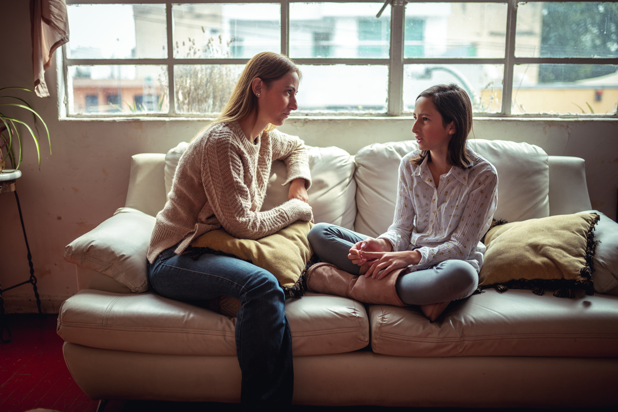 Mother and daughter talking