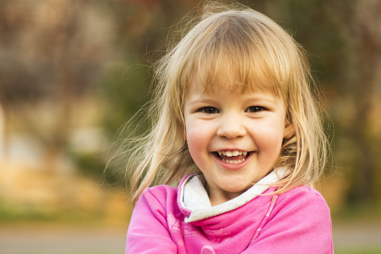 happy laughing cute little girl portrait