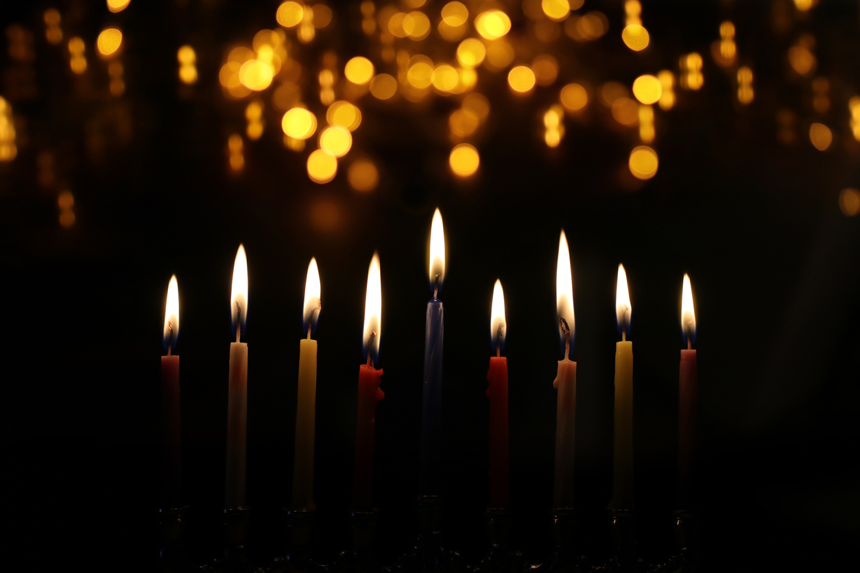 Religion image of jewish holiday Hanukkah background with menorah (traditional candelabra) and candles