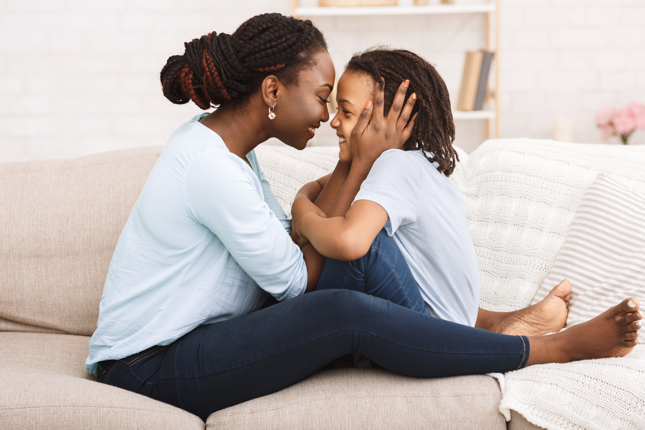 Loving black family spending time together at home