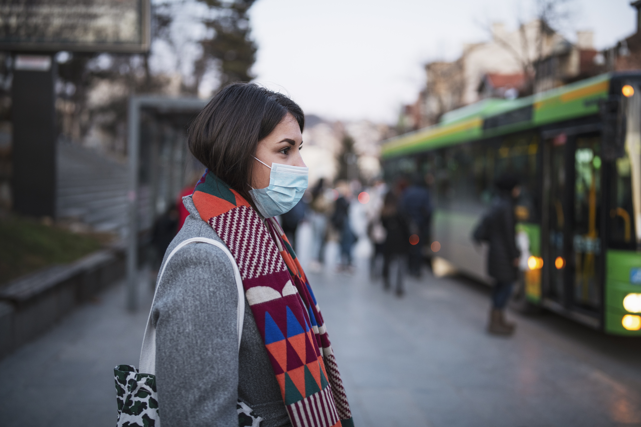 Woman In Town Wearing Protective Face Mask.