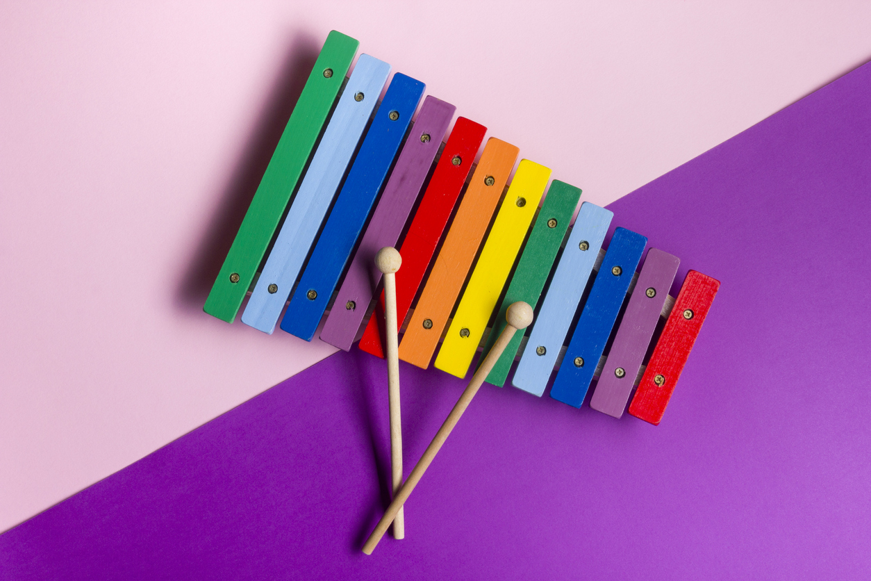 Colorful child wooden xylophone isolated on white background