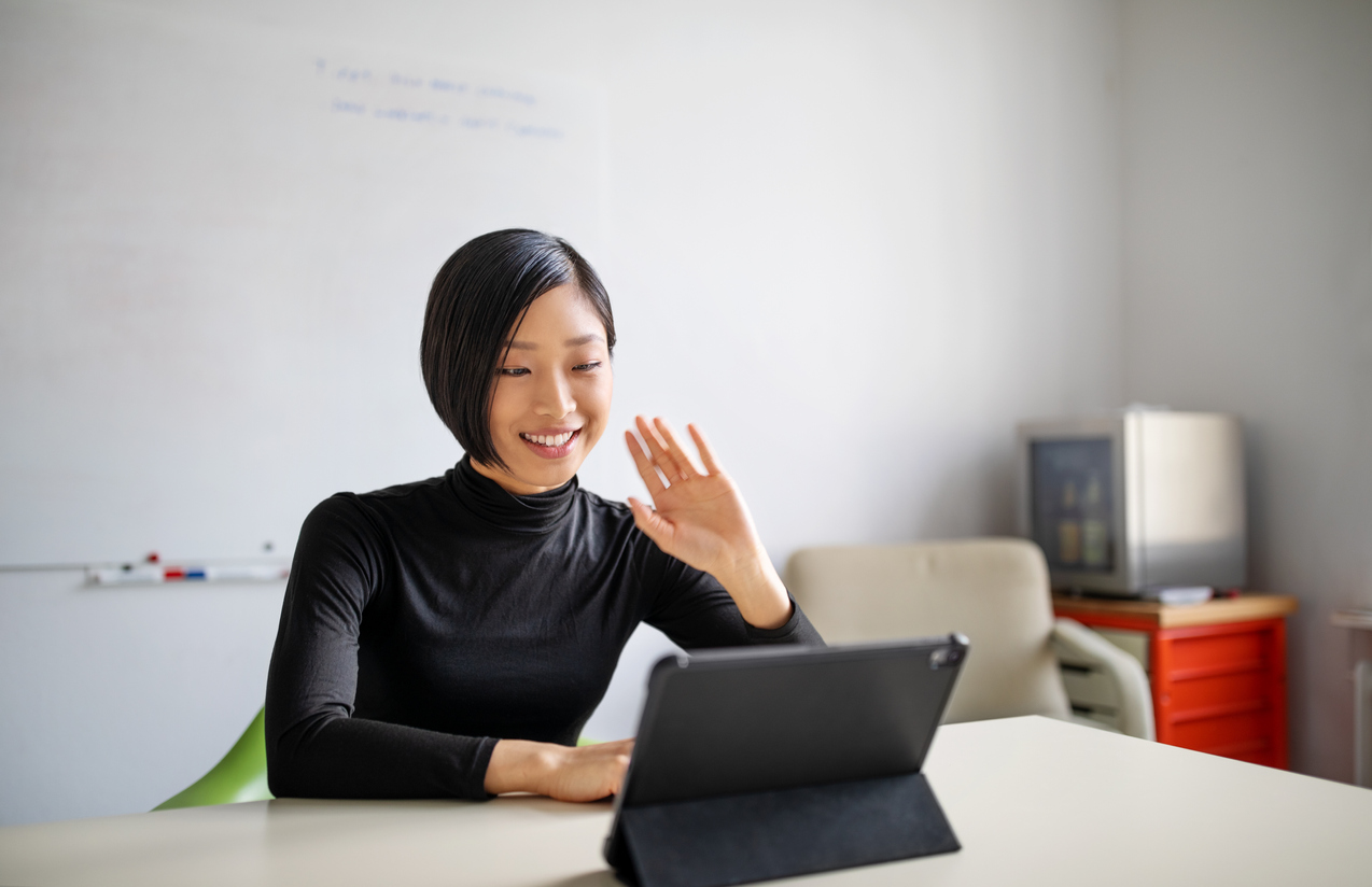 Female professional making a video call in office