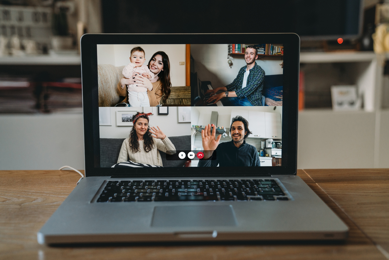 Laptop with a videoconference call on the screen