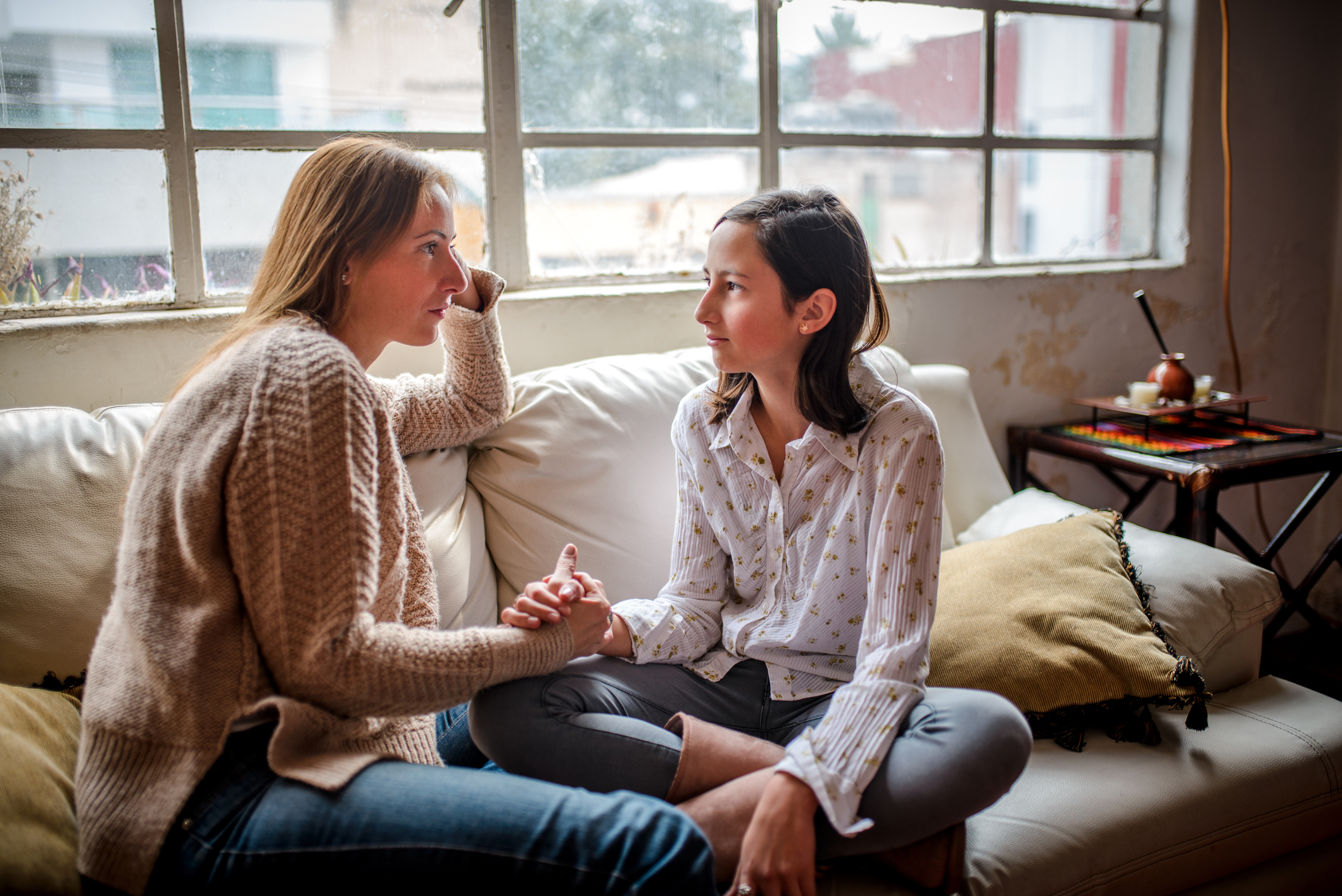 Mother and daughter having a talk.