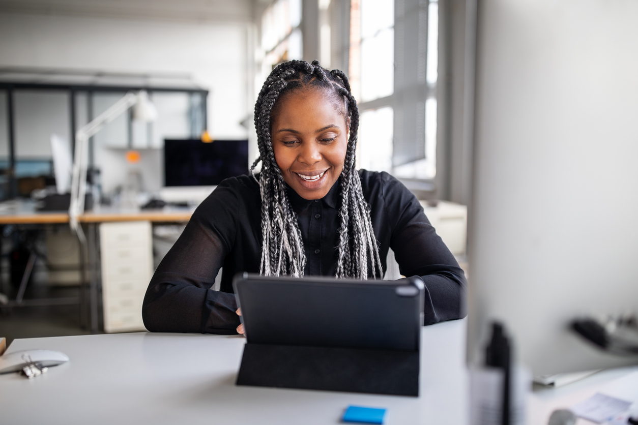 Businesswoman making a video call with digital tablet