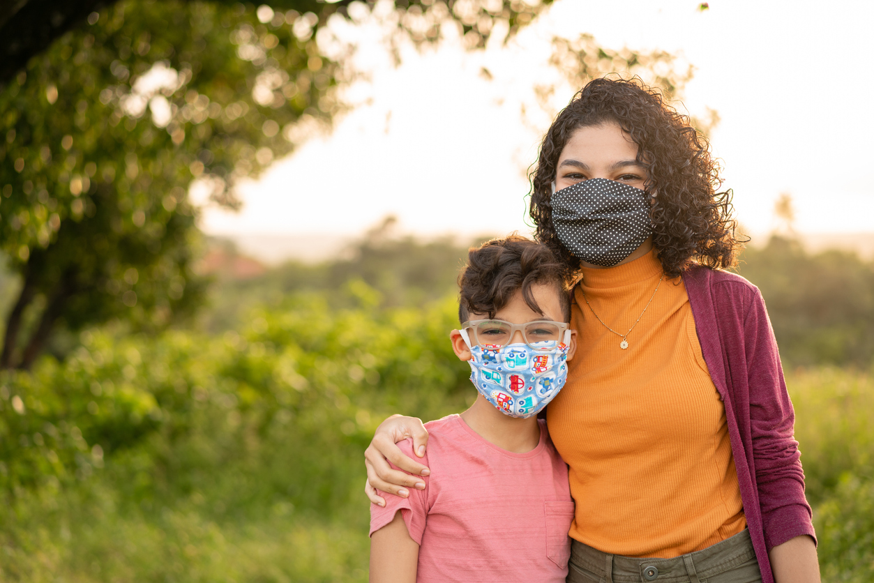 Children wearing N95 mask outdoors