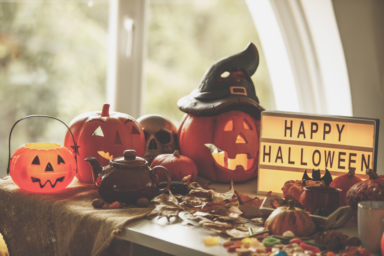 Front view of Halloween themed setting against the window in day time