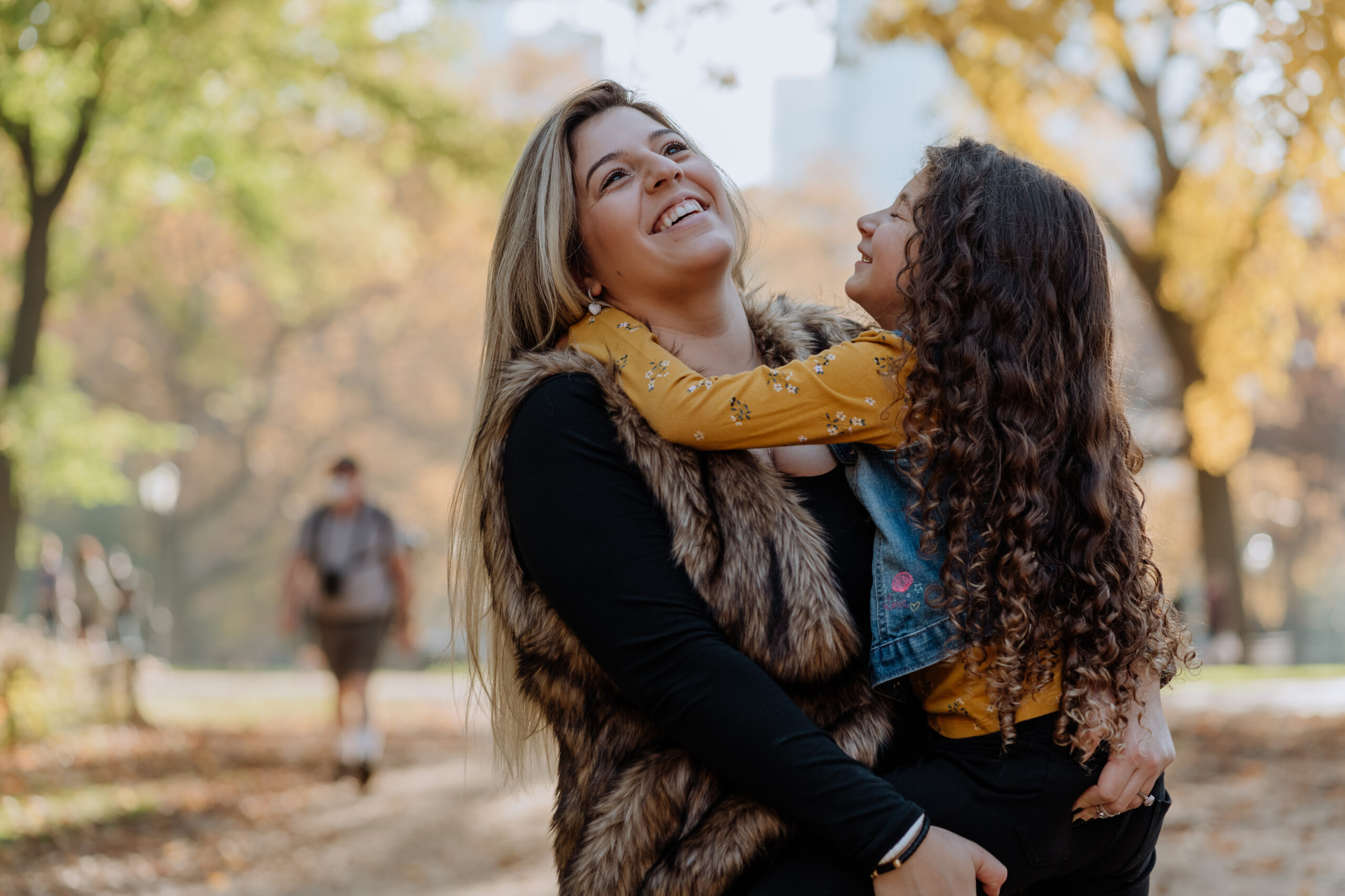 Mother and daughter together in Central Park in New York