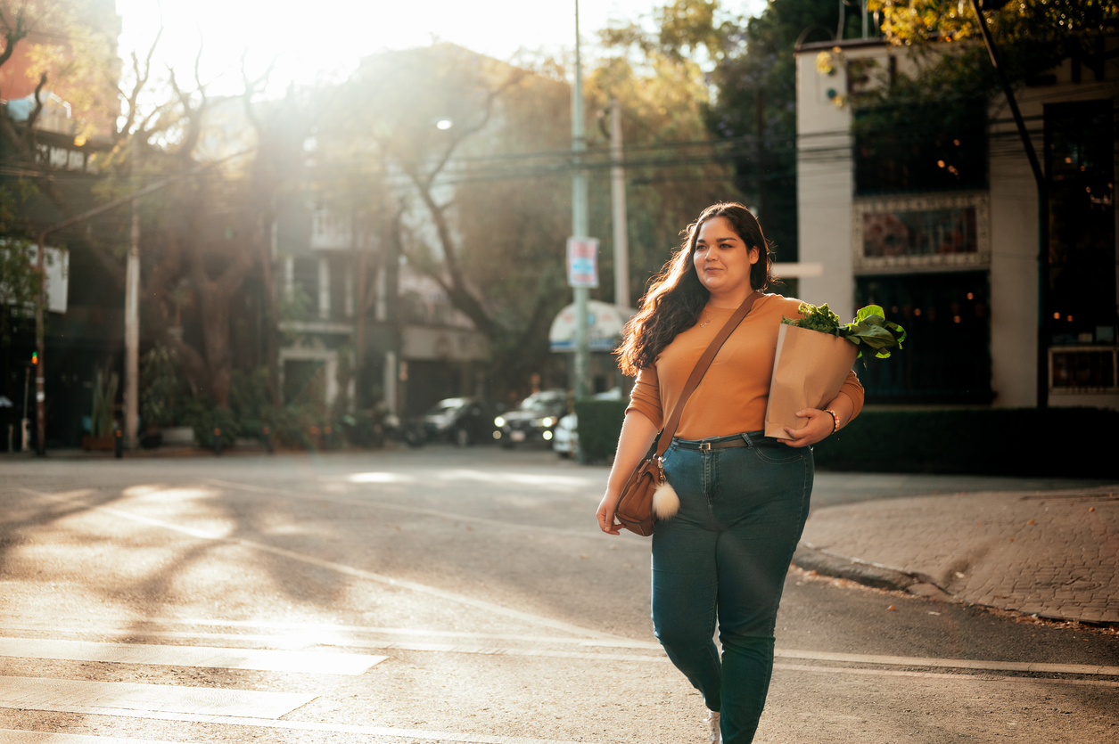 Woman crossing street